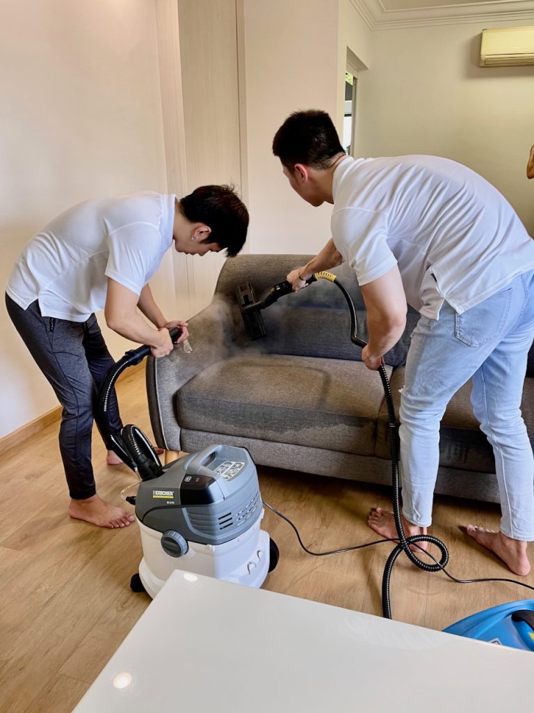 Three Butlers Professional Cleaning Specialist Performing Steam Sofa Cleaning in Singapore